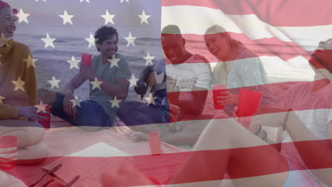 animation of flag of usa over happy diverse friends at beach party in summer