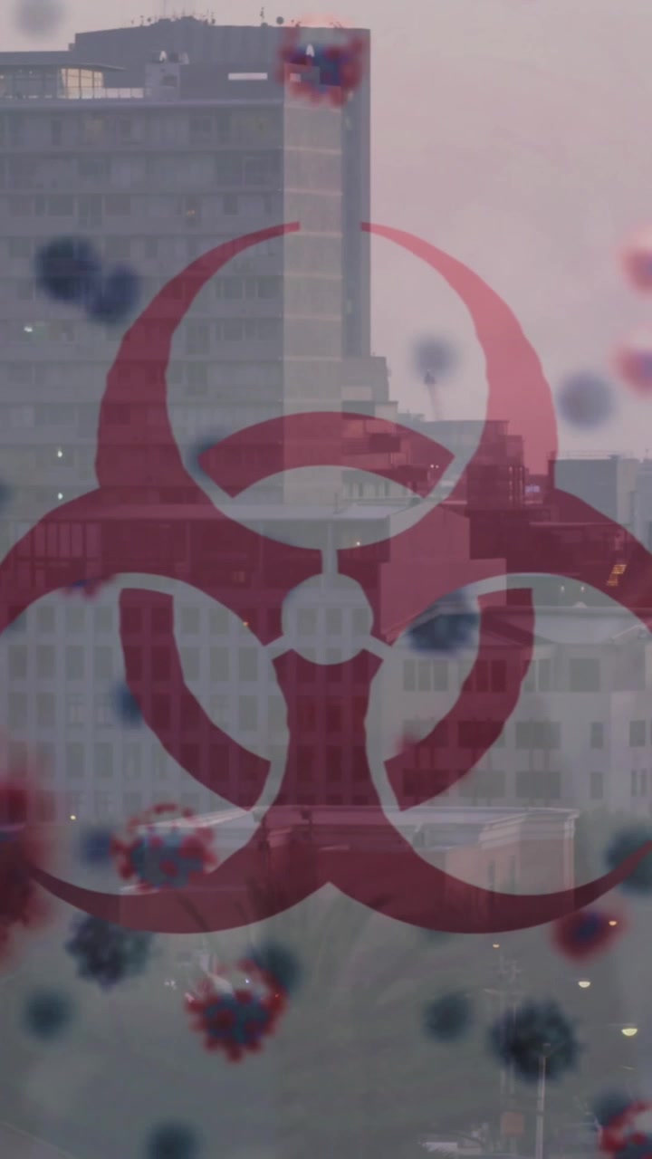 Animation of biohazard and virus cells over cityscape