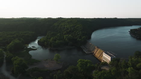 city of rochester municipal hydro-electric plant in zumbro river during sunset in minnesota, united states