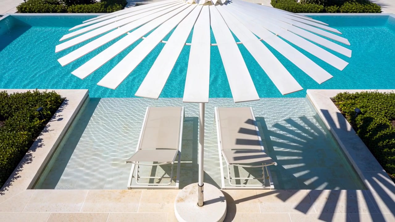 Casting large white parasol sending shifting radial shadow across beige loungers, sunlight moving