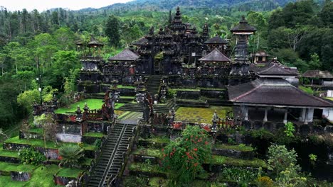 majestic and awe-inspiring, its tiered pagodas and intricate architecture rise against the backdrop of lush green hills, creating a harmonious blend of man-made and natural beauty