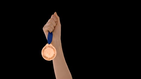 hands throwing a medal