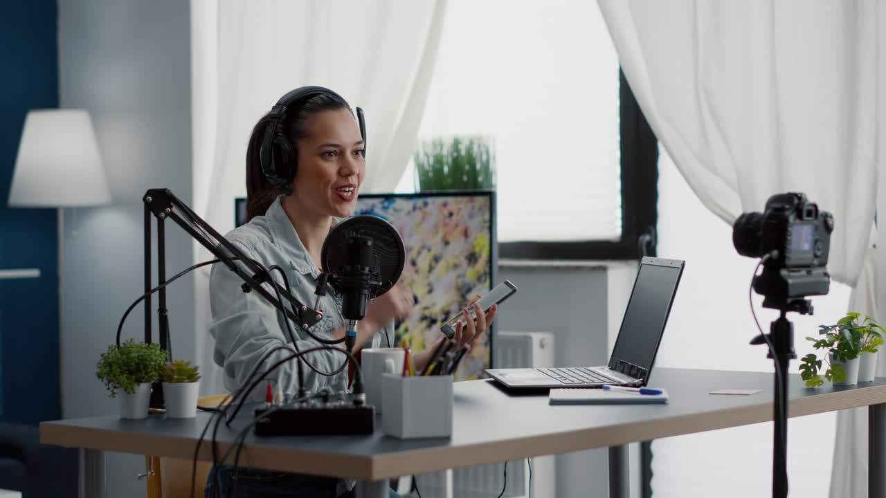 Famous internet influencer taking selfie photo with smartphone while streaming