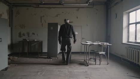 weathered elderly man wandering through desolate abandoned office, footsteps echoing amid scattered papers and peeling walls, embodying profound sense of forgotten memories and lingering melancholy