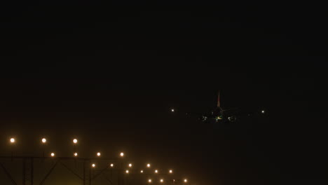 airplane landing at night