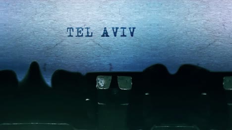 tel aviv words word closeup being typing and centered on a sheet of paper on old vintage typewriter