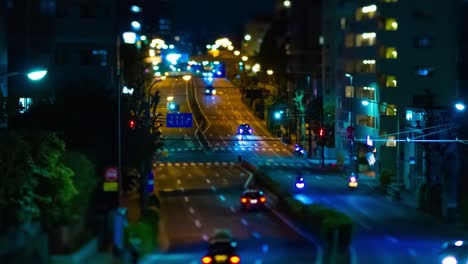 a night timelapse of the miniature traffic jam at the downtown street in tokyo