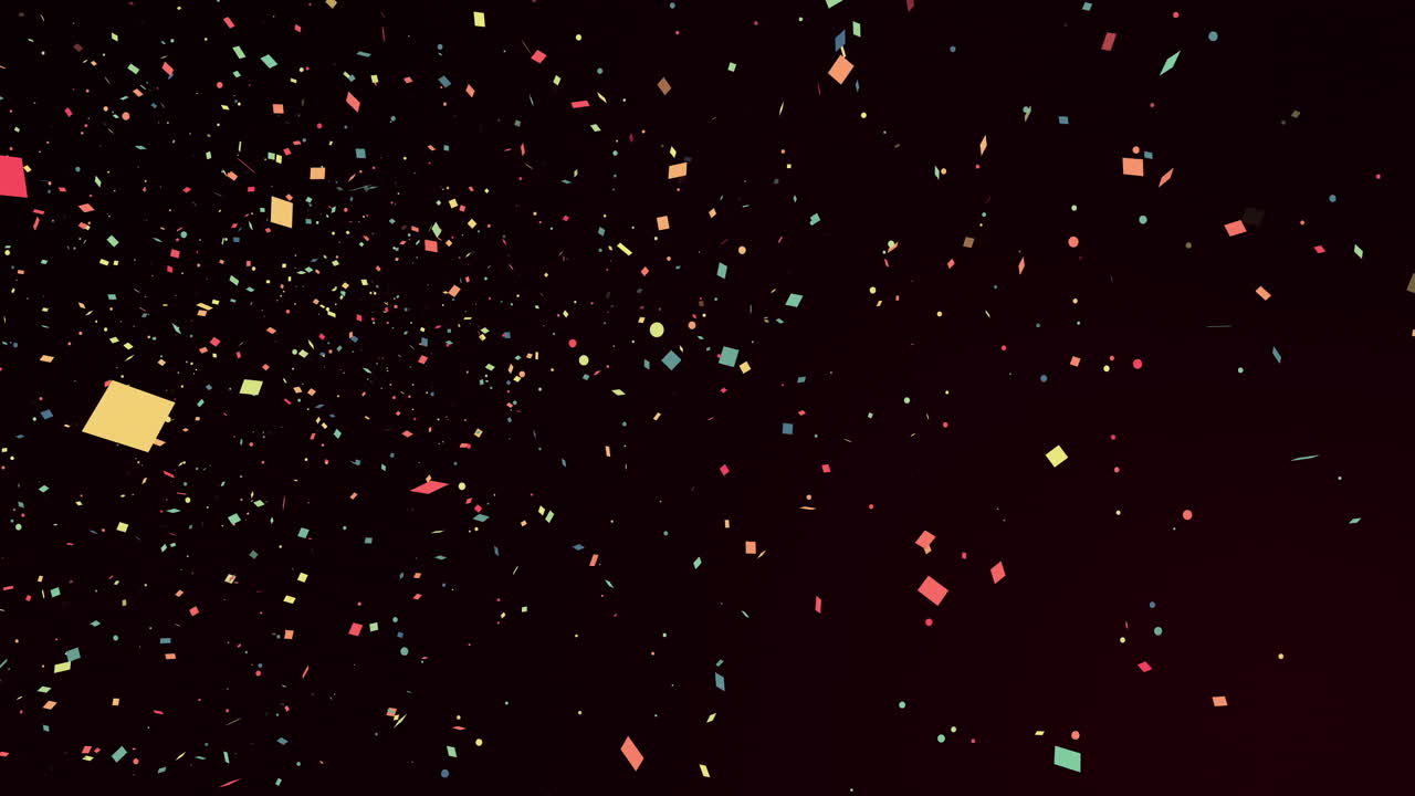 Pedaços de confete multicoloridos caindo suavemente em um fundo preto.