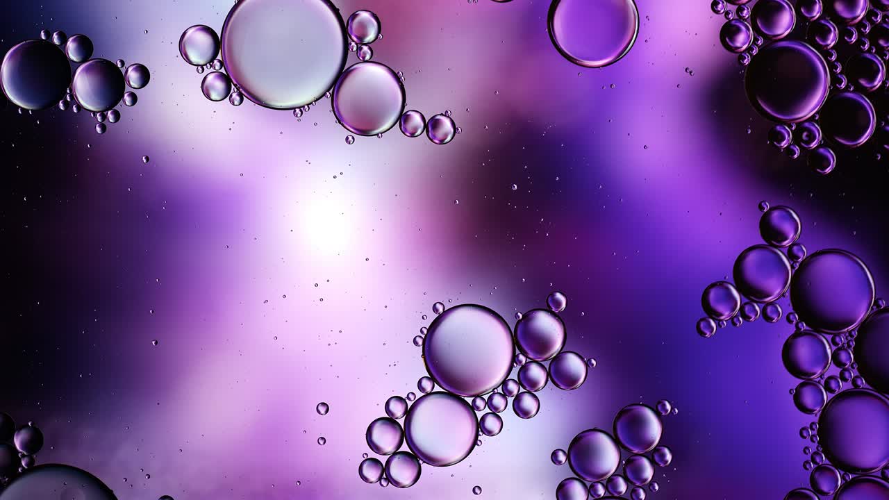 Abstract Colorful Food Oil Drops Bubbles and spheres Flowing
