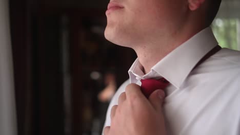 a man wears a shirt and tie