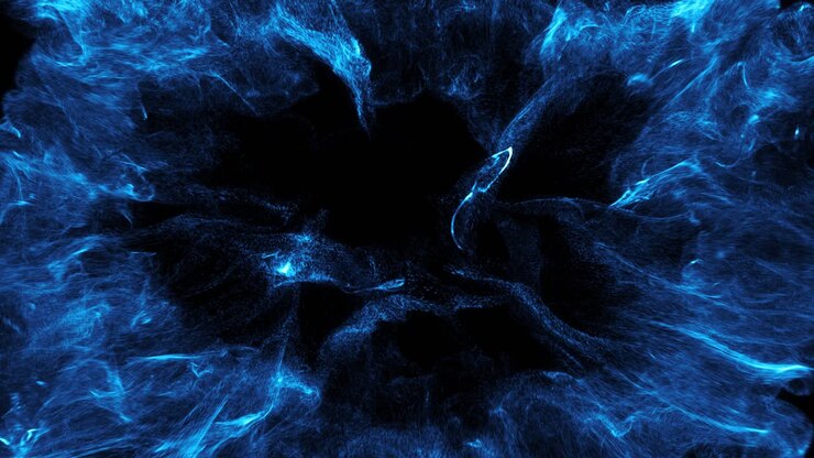 Dynamic Blue Particle Explosion Effect on Black Background