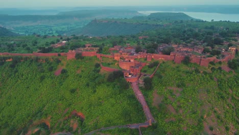 aerial drone shot of a indian fort during time of sunrise at narwar , shivpuri , madhya pradesh