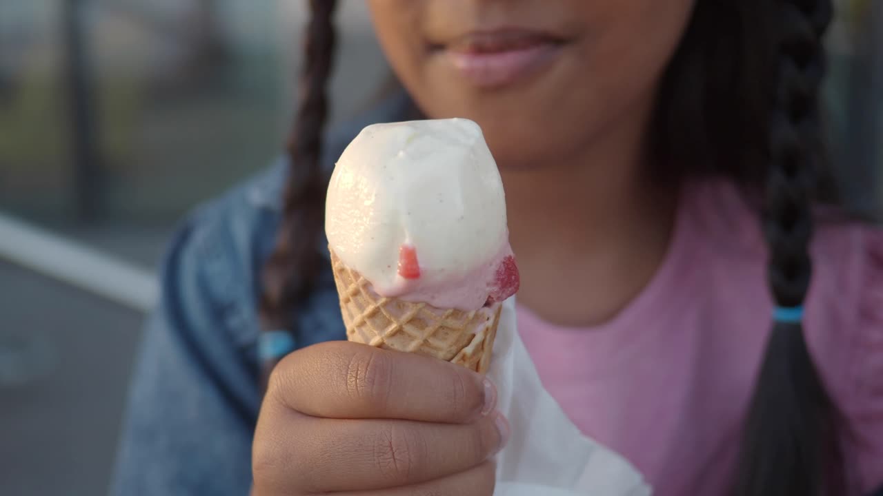 Girl eating ice cream cone