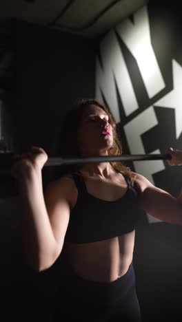 woman working out with resistance band in gym