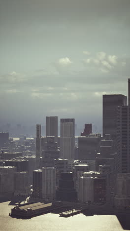 aerial view of a modern city skyline with skyscrapers and a river