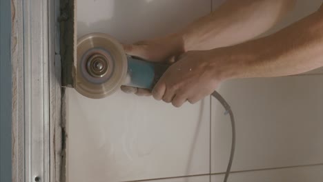 cutting tiles in a bathroom renovation