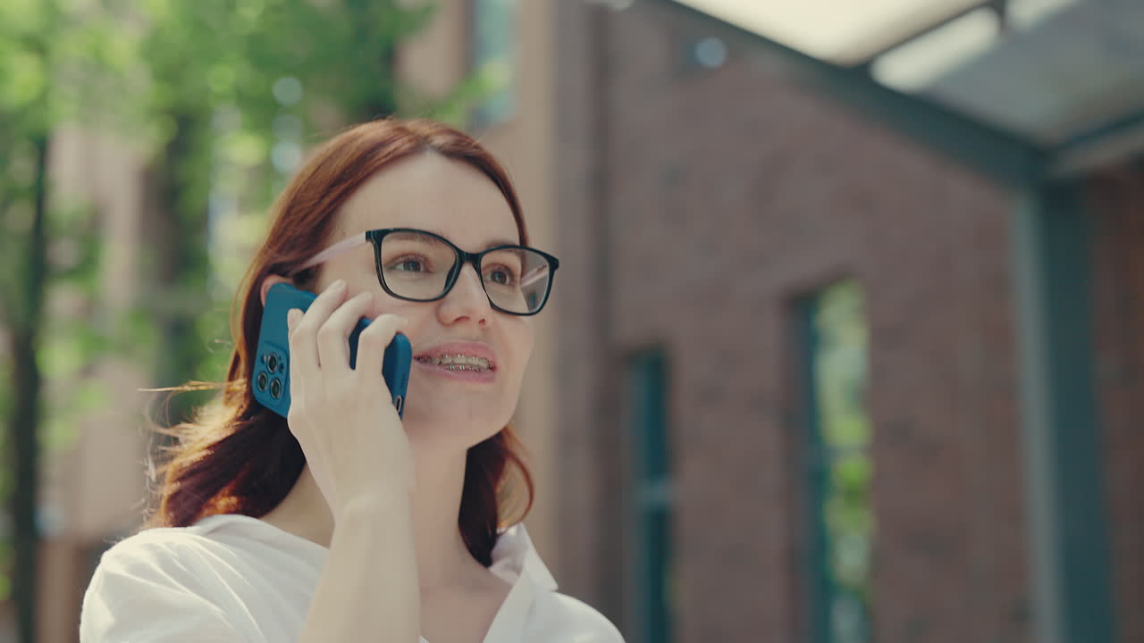 Woman on Phone Outside