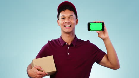 Phone,-green-screen-and-delivery-man-in-a-studio