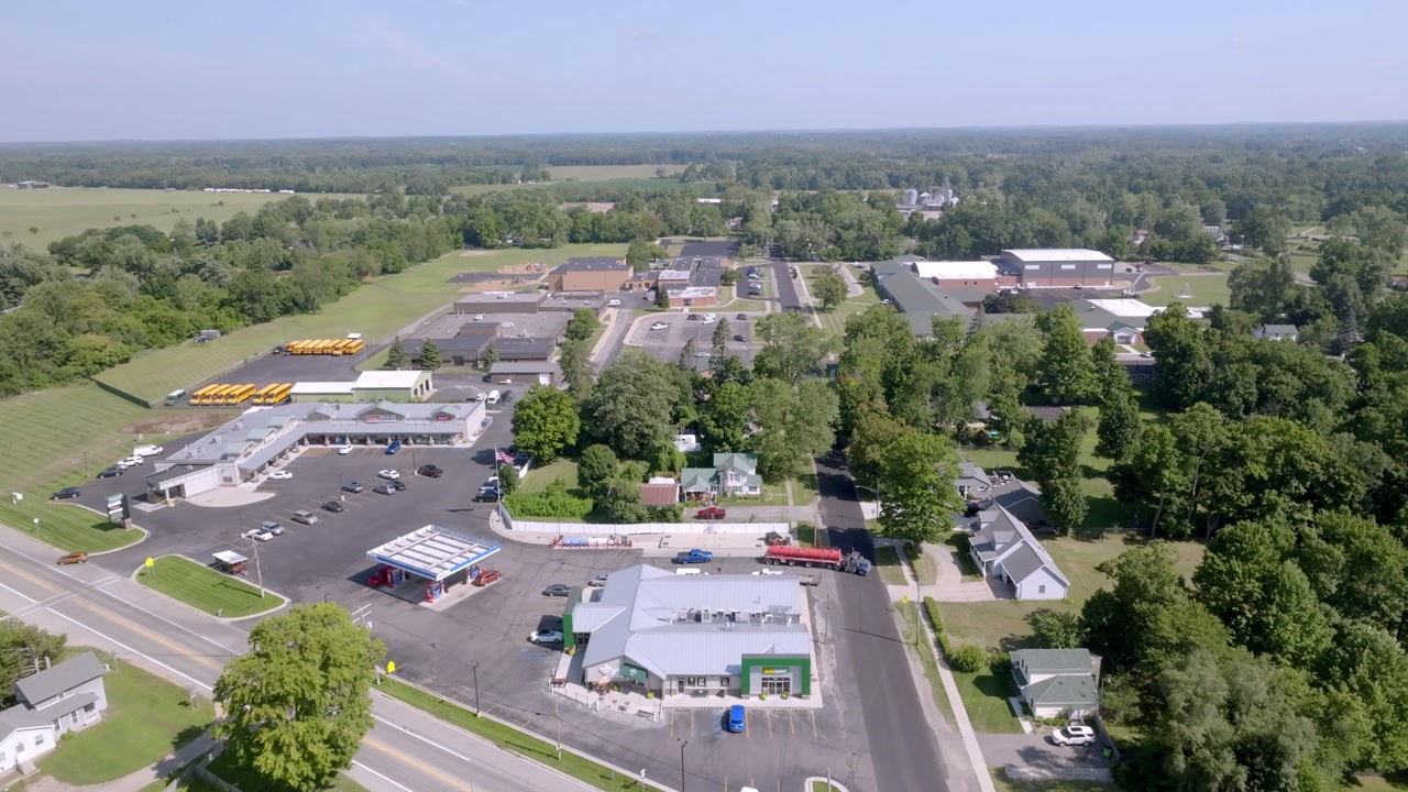 Napoleon, Michigan downtown with drone video moving up.