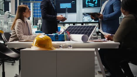 factory executives present sustainable manufacturing solutions to investors