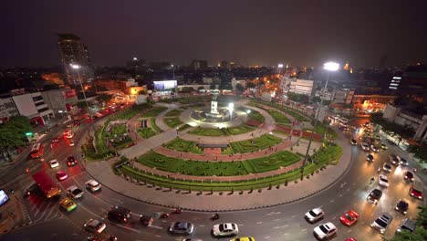 wongwian yai roundabout. aerial view of highway junctions. roads shape circle in structure of architecture and technology transportation concept. top view. urban city, bangkok at night, thailand.