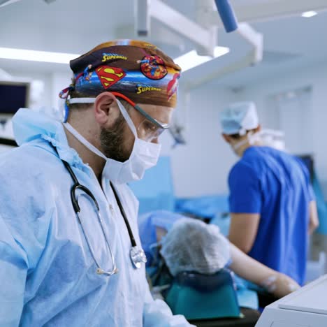 surgical team preparing their patient for surgery. team surgeon at work in operating room.