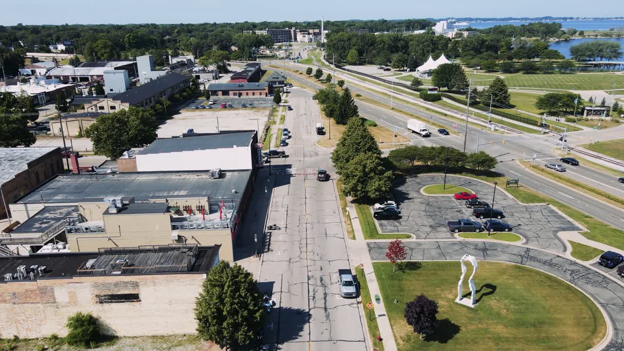 Tracking or dolly motion showing Western ave in Shaw Walker in the distance
