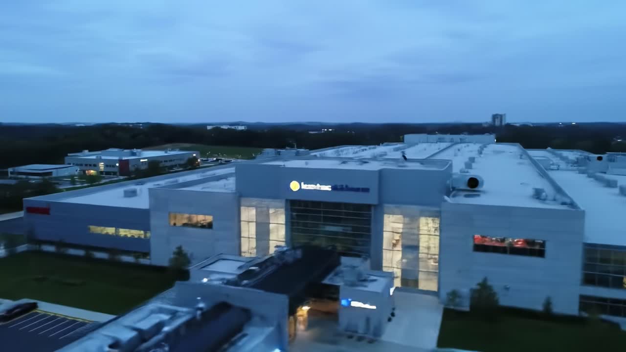 Aerial View of a Large Commercial Building Complex at Dusk