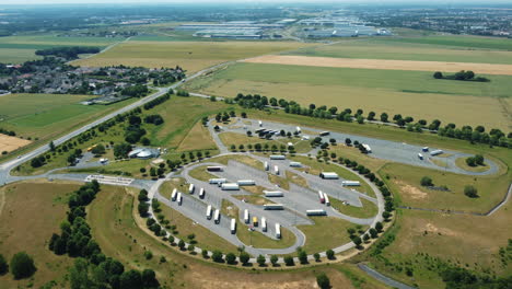 aerial view of a truck stop and surrounding landscape