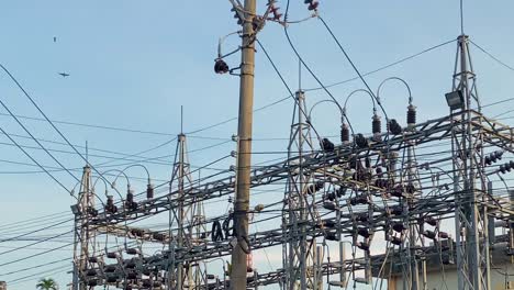 old style electrical substation. electrics power lines.