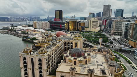 an aerial view of a city with a large body of water