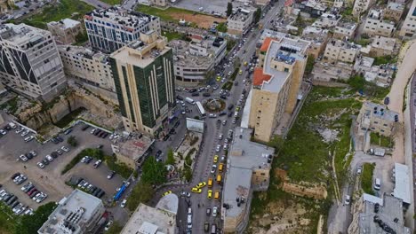 traffic jam at roundabout in downtown hebron in palestinian west bank