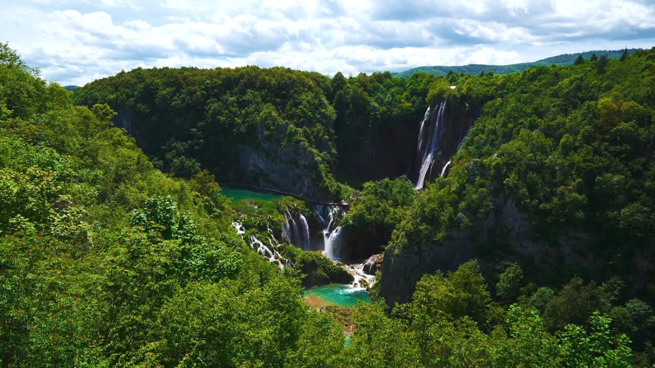 Nature landscape view of clear river and waterfall cascades at Plitvice Lakes National Park, Croatia