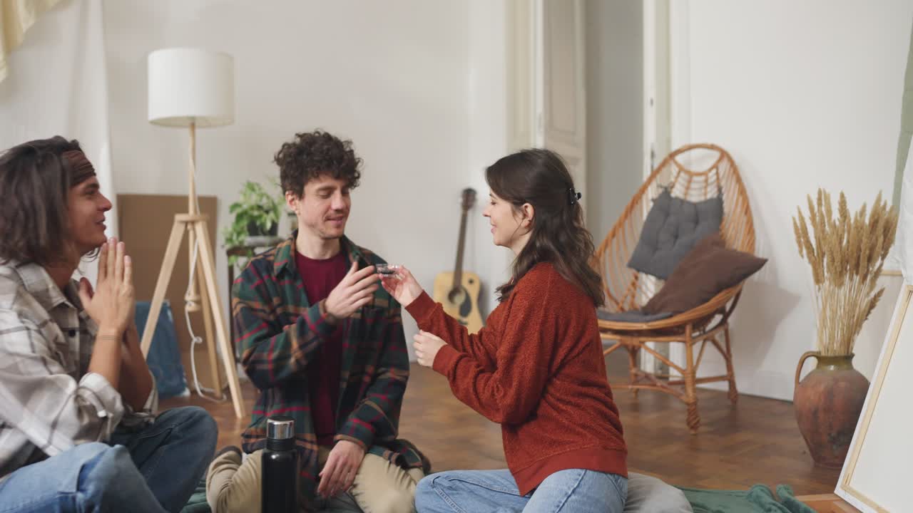 Friends Enjoying Drinks in a Home