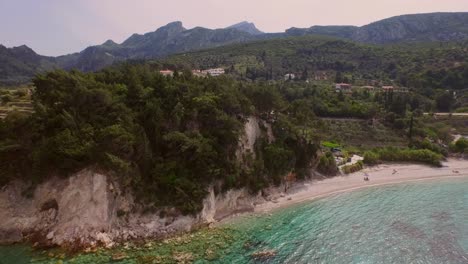 Aerial:-A-quiet-beach-on-Samos-island,-Greece