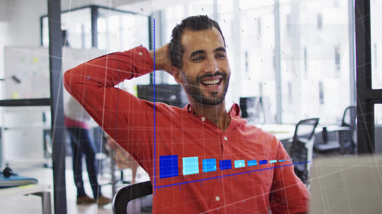 Man studying business chart overlay fading in on laptop and reacting with surprised satisfied smile