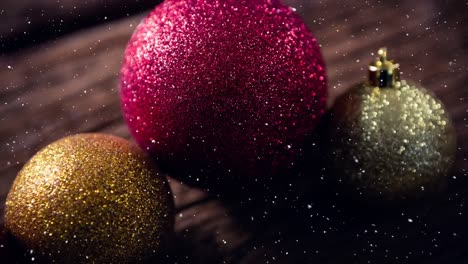 Falling-snow-with-Christmas-bauble-decorations