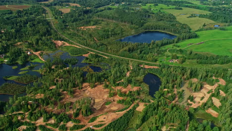 Lake-with-thousand-islands-and-green-landscape-in-resort-area,-aerial-drone-view