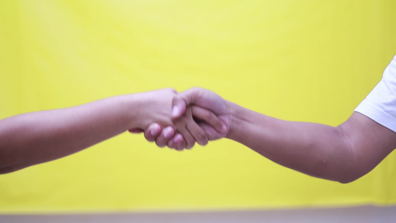 Handshake, people meeting and yellow screen for welcome, thank you and support, agreement or b2b onboarding