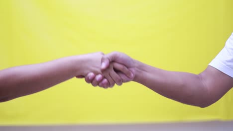 Handshake, people meeting and yellow screen for welcome, thank you and support, agreement or b2b onboarding