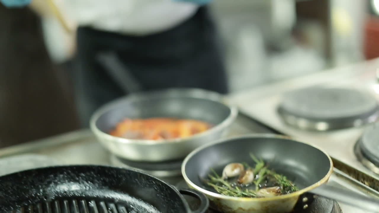 Professional Kitchen, Preparing Dinner. Restaurant kitchen with stove with pan, preparing dinner