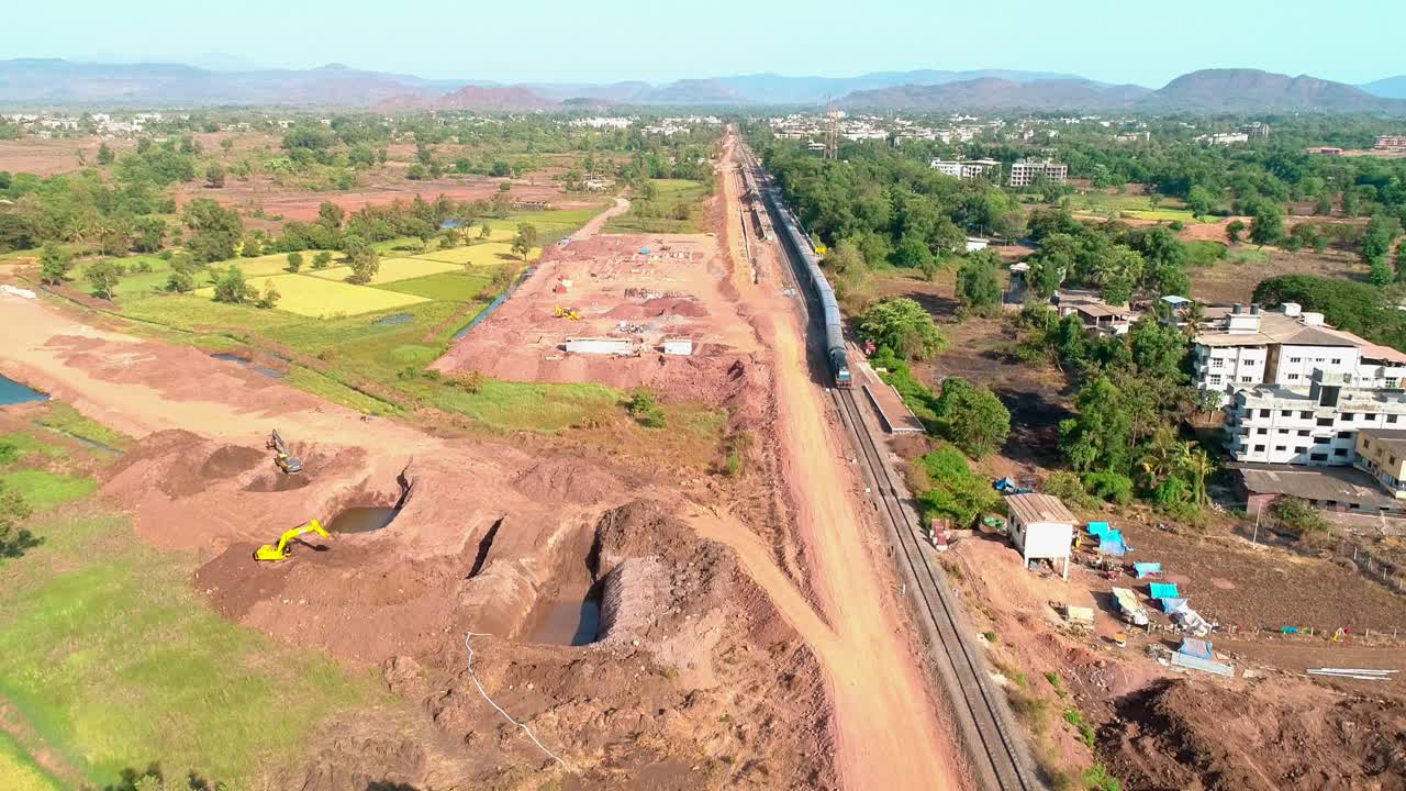 indian railway passing by station india