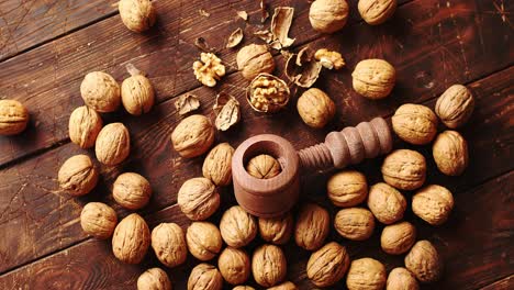 Nutcracker and nuts lying on table