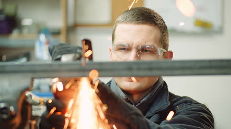 angle grinder cutting metal at workshop 32