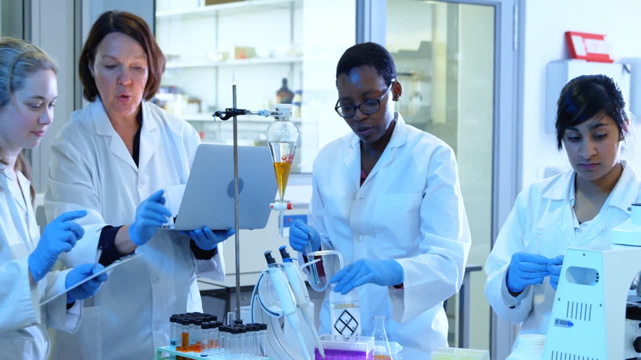 Scientist experimenting in laboratory 4k