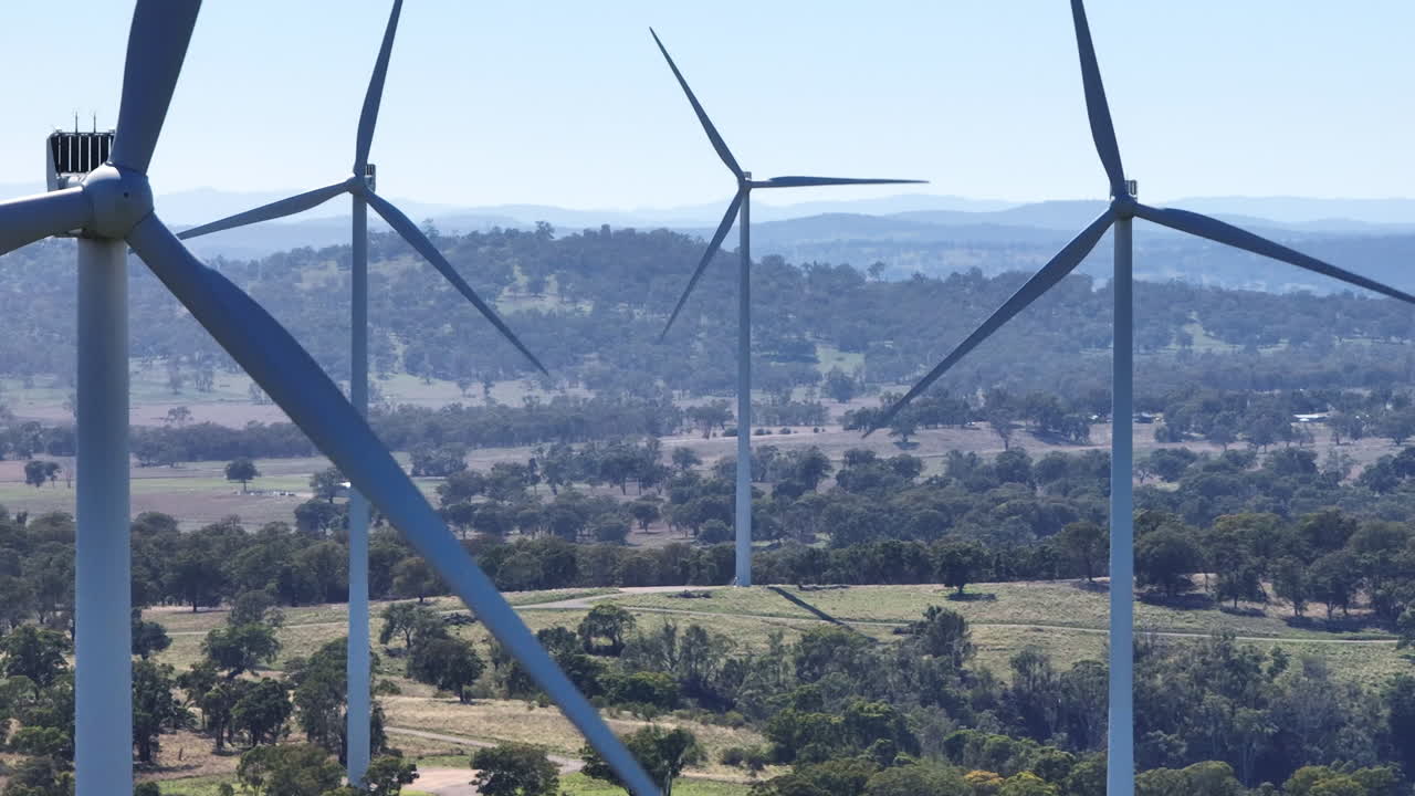 Close View Telephoto Drone Of Wind Turbines Turning In Wind In Australia, 4K