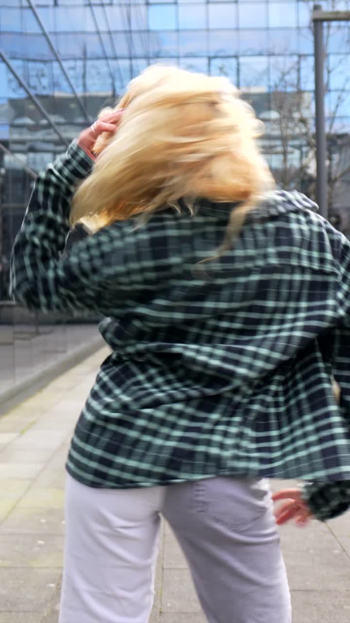 Woman with Blonde Hair in Plaid Shirt
