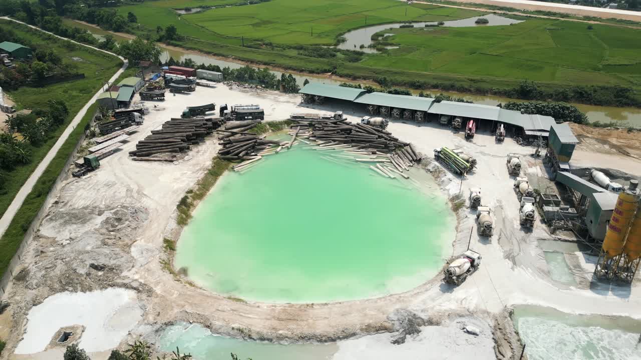 Aerial View of a Construction Site with Concrete Plant and Lumber Yard