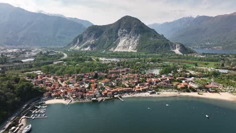 beautiful establishing aerial drone shot of lago maggiore italy