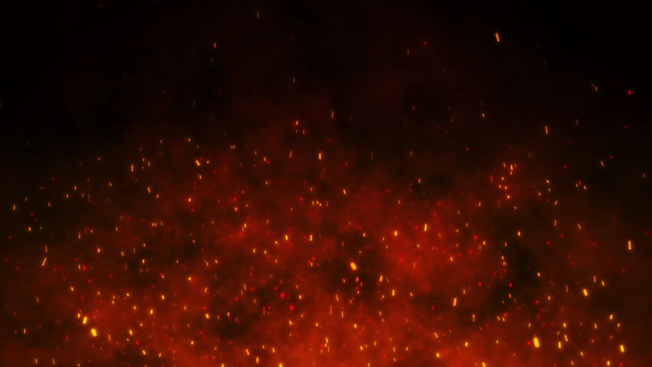 Fire embers particles over black background.
